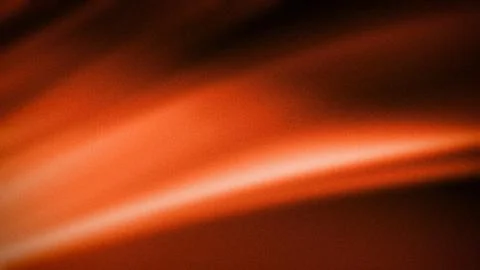A warm 4K grainy gradient background featuring vibrant shades of orange and.. 스톡 일러스트
