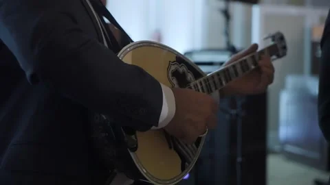 Warm Ambient Lighting Enhances Performance, Closeup Of Artist Performing Amid Stock Footage 323774859