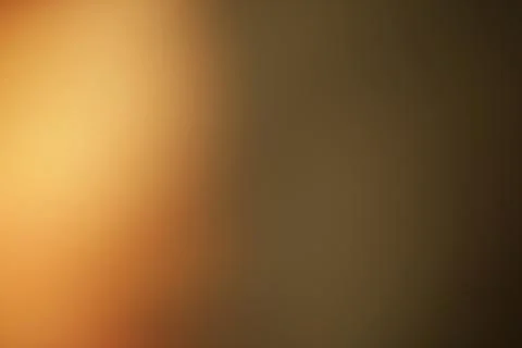 Warm and Earthy Gradient Background with Soft Blurry Texture Stock Photos