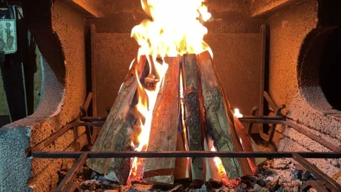 Warm and Inviting Fire Crackles in Cozy Cabin Setting on a Chilly Evening Stock Footage 316480765