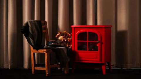 A warm and inviting winter scene with a retro red fireplace. Stock Footage 328409915