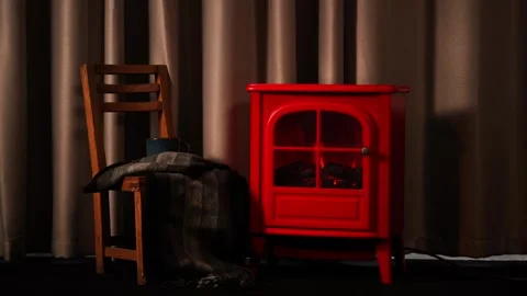 A warm and inviting winter scene with a retro red fireplace. Stock Footage 328409995
