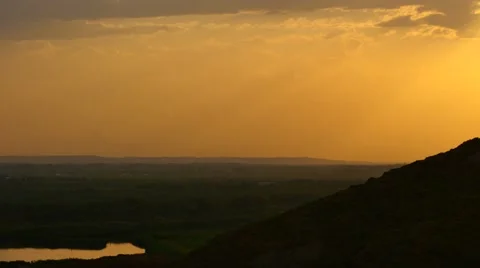 Warm and Soft Sunset Glow over Countryside Stock Footage 53232813