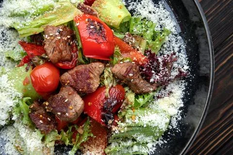 Warm Beef Salad with Cherry Tomatoes and Parmesan Stock Photos