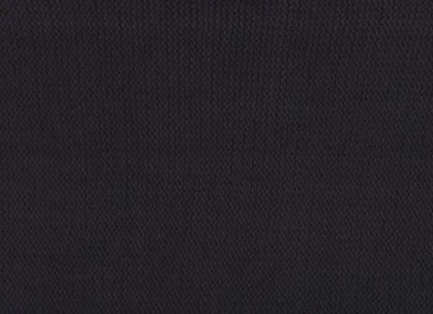 Warm black sweater made of wool. Black  fabric background. 스톡 일러스트