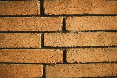 Warm Brick Wall Texture: Rustic Brown Brick Background Stock Photos