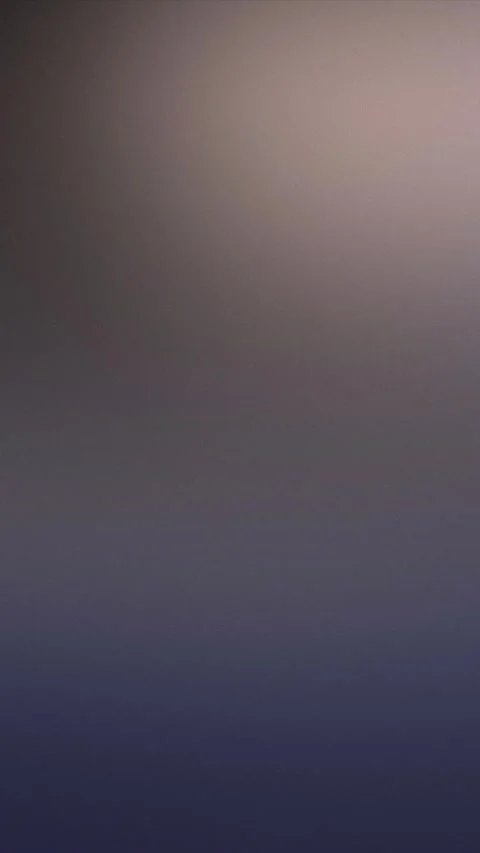 Warm brown to dark olive gradient texture. Seamless loop background. 4K. Stock Footage 309701647