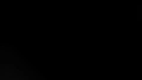 Warm Brown Light Leak Overlay on Black Background Stock Footage 337870890