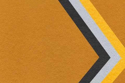 Warm brown paper texture background with yellow black chevron stripes and c.. 스톡 일러스트