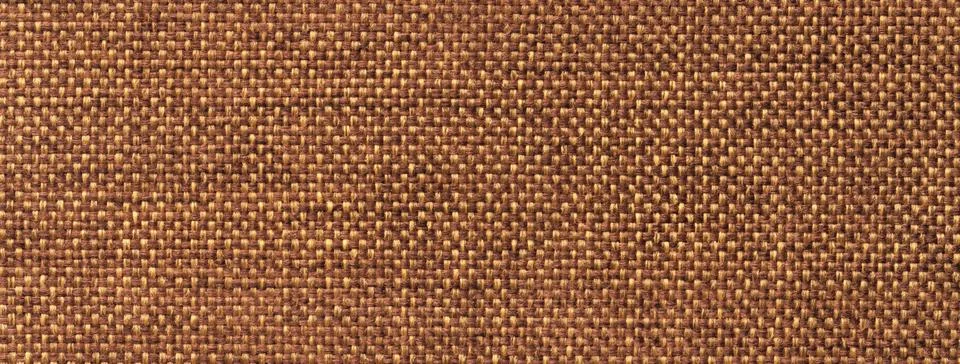 Warm brown woven textile texture background, macro. Structure of copper fab.. Stock Photos