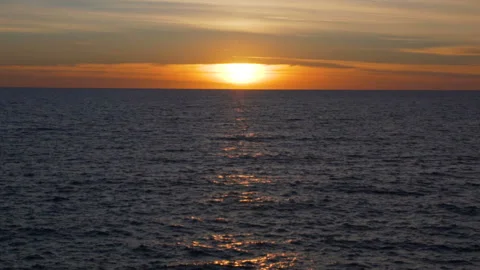 Warm calm sunset over the mediterranean sea, golden light over the water Stock Footage 108313573
