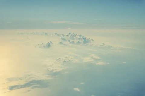 Warm clouds from above Stock Photos