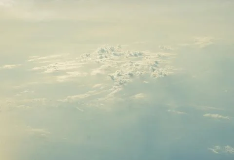 Warm clouds from above Stock Photos