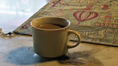 Warm Coffee Cup Close-Up on Marble Surface  4K 60fps Vidéo 311657869
