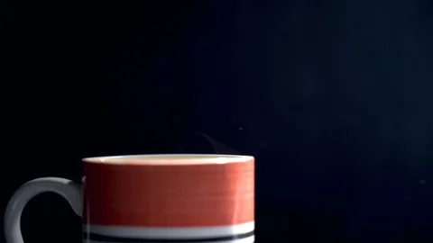 Warm Coffee with light steam 4k Stock Footage 121668438