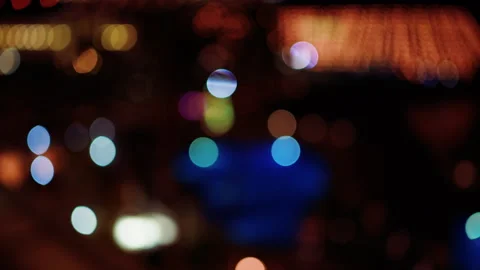 Warm Colorful Bokeh Rays On Dark Background Night City Lights Video stock 327620378