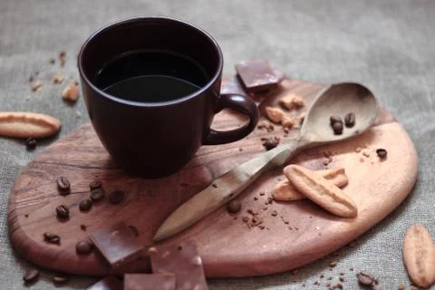 Warm cup of caffee on brown background Stock Photos