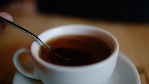 Warm Cup of Tea being Stirred Stock Footage 86074347