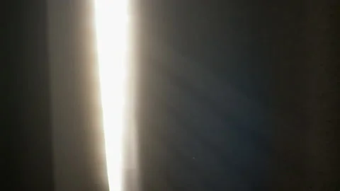 Warm Dreamy Light Shining Through Black Curtains 4K Stock Footage 170921449
