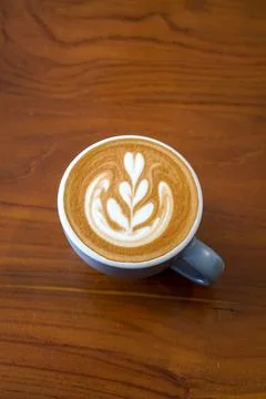 A warm espresso-based drink with steamed milk and smooth foam Foto stock