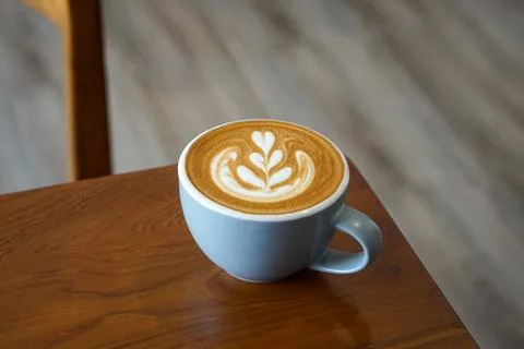 A warm espresso-based drink with steamed milk and smooth foam Foto stock