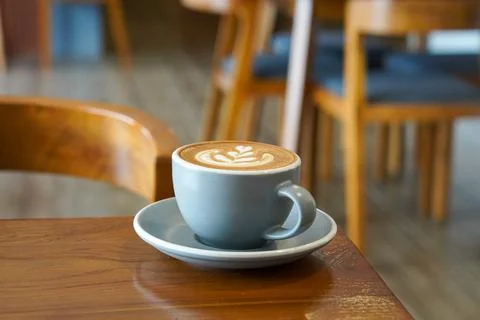 A warm espresso-based drink with steamed milk and smooth foam Stock Photos