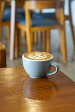 A warm espresso-based drink with steamed milk and smooth foam Stock Photos