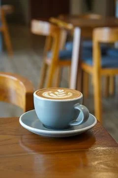 A warm espresso-based drink with steamed milk and smooth foam Stock Photos