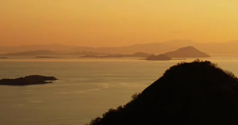 Warm Evening Light Over Tropical Sea Labuan Bajo Indonesia 스톡 동영상 330926693