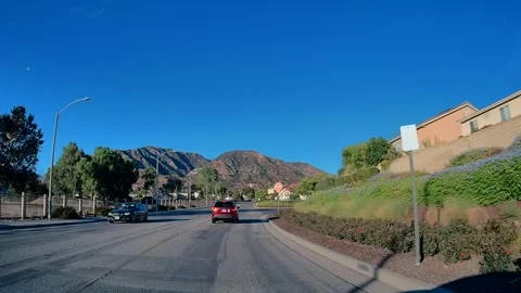 Warm evening light on a suburban commute, Los Angeles Video stock 343475997