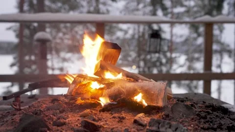Warm Fire Inside a Swedish Log Cabin in the Winter Stock Footage 303044679