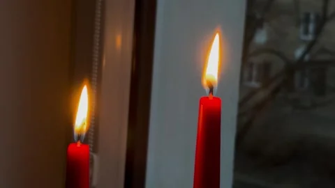 Warm fire from red candles Stock Footage 304611424