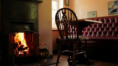 Warm fireplace and seating area, country pub Stock Footage 35192995