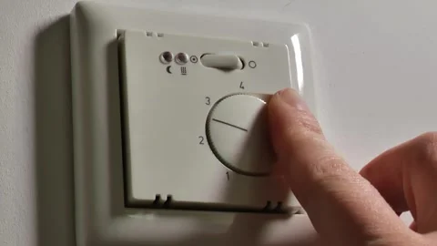 Warm floors switch.Heating the house with warm floors. Stock Footage 250473719