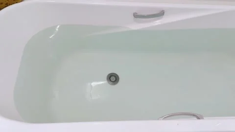 Warm Flow Meets Porcelain Surface: A Subtle Motion Moment Video stock 313378683