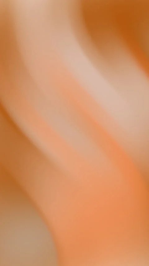 Warm flowing abstract background with soft orange and brown gradients Stock Footage 327253444