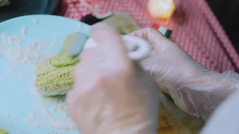 Warm food study: coating grilled corn with a thick cheese layer Stock Footage 342171988