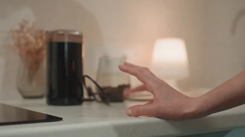 Warm glow and gentle touch. Evening ambiance with tactile sensory experience Stock Footage 342064011