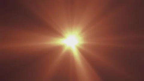 Warm glow bursts from center, radiating bright rays Stock Footage 345435095