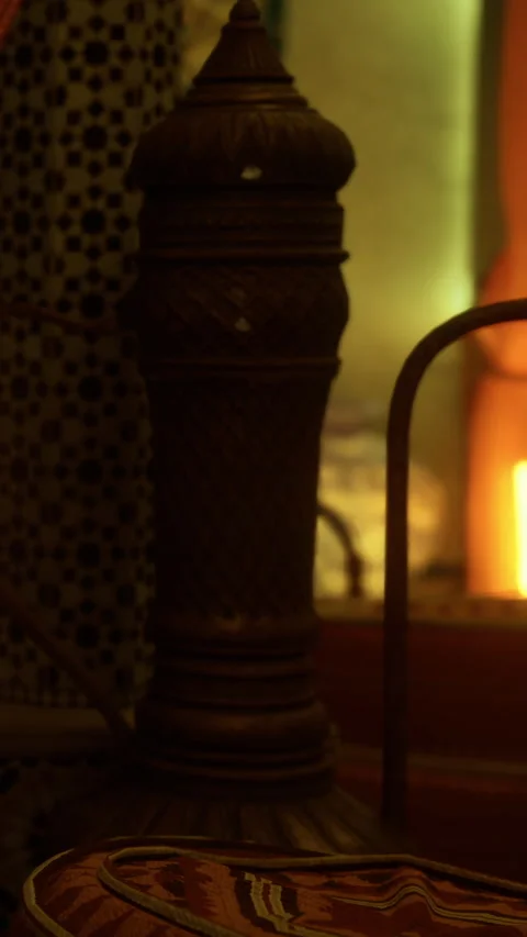 Warm glow from a fire in a cozy room with decorative elements around Stock Footage 331709960