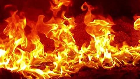 Warm Glow of Flames Dancing in a Cozy Fireplace at Night Stock Footage 345427109