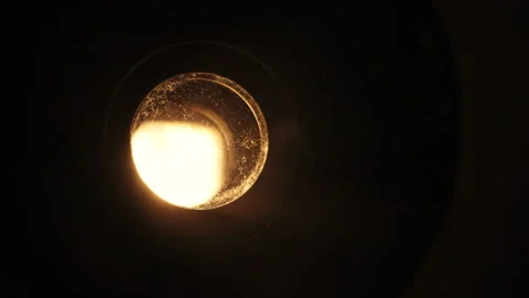 Warm glow projector beam light. Nostalgic charm classic cinema. Retro filmmaking Stock Footage 263564848