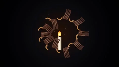 Warm glowing candle flame illuminates dark background, symbolizing hope and.. Stock Footage 344641202