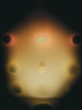 Warm glowing orbs on soft-focus background Stock Photos