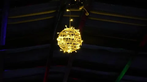 Warm Glowing Spherical Hanging Light Fixture Stock Footage 321361611