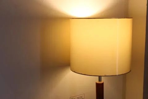 Warm glowing table lamp Stock Photos