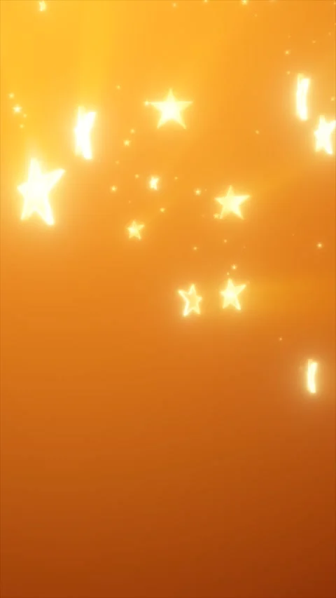 Warm golden background with glowing star-shaped particles, creating a magic.. Stock Footage 323870763