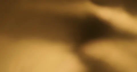 Warm golden light leak background soft lens flare effect 스톡 동영상 343756069