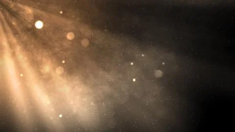 Warm golden light rays shining from the top-left with glowing bokeh circles.. Stock Photos