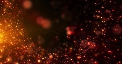 Warm golden particles floating on dark background, glowing bokeh sparks and s Stock Footage 324956831